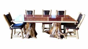 The table's angled legs add a touch of contemporary style, while upholstered seating on the side chairs ensures comfort for extended mealtimes and good conversation. Red Cedar Table With Stump Base Ez Mountain Rustic Furniture