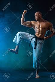 Today we're taking a look at the smok fit kit. Karate Or Taekwondo Fighter On Black Background With Smoke Fit Stock Photo Picture And Royalty Free Image Image 141748874