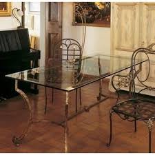 Pair your wrought iron patio dining set with other wrought iron furniture like lounge chairs, chaise lounges, end tables, and more for a coordinated look perfect for entertaining guests. Furniture Chintaly Imports Wrought Iron Dining Table Base Home Kitchen