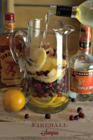 This Fireball Sangria Recipe Is A Crisp White Wine Sangria With A Strong Cinnamon Flavor Subtle Hit Sangria Recipes Christmas Drinks Alcohol Christmas Sangria