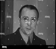 Witness Joseph Perrone Giving Evidence in the Lindbergh's Kidnapping Case  Trial, 1930s. USA. "The crime of the century". 'Joseph Perron,  Bronx taxi man who delivered a ransom note, looks directly at Hauptmann