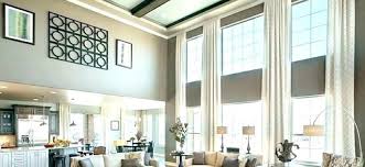 Embrace the luxurious and grand feeling that a cathedral ceiling brings with these resembling the shape of churches and cathedrals, these ceilings typically consist of two slanted sides that meet at a point. High Ceiling Window Treatment Ideas From Top Designers Zebrablinds Ca