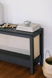 Large rattan console table features intricate chinese chippendale style fretwork and a tessellated marble top with matching coin detailing. Pin On Home