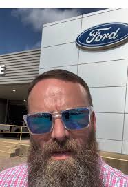 Bearded Car Salesman
