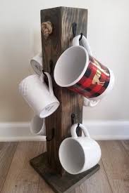 If you've got a big family or if you're a big tea and coffee drinker, you undoubtedly have a lot of them hidden in drawers around your kitchen. Check Out This Item In My Etsy Shop Https Www Etsy Com Listing 892296718 Reclaimed Wood Farmhouse Coffee Mug Tree Mug Tree Coffee Mug Tree Farmhouse Mugs