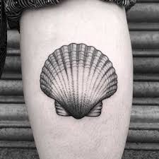 A seashell makes a special tattoo pattern with its mysterious form and various styles. Scallop Shell Tattoo By Lozzy Bones Tattoogrid Net