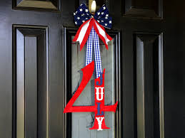 Greet every guest with patriotic porch decor like bright string lights and door mats. How To Make A Diy July 4th Wreath Craftcuts Com
