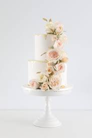 4 tier white round wedding cake with cascading flowers and bride and groom figurine topper.jpg 3.33; Wedding Cakes Brisbane Wedding Cake Sunshine Coast Gold Coast