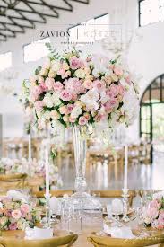 Add to favorites more colors pink paper butterflies die cut butterflies pink wedding scrapbooking wedding decoration pink butterflies wedding table butterflies. This Stunning Mass Arrangement Is Everything We Love The Roses White Pink R Flower Centerpieces Wedding Tall Wedding Centerpieces Wedding Reception Flowers