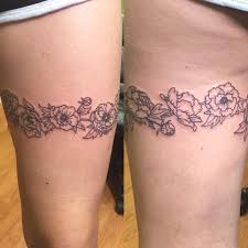 Talented tattoo artists can even make garter thigh tattoos appear very realistic. Flower Tattoo Garter Nice