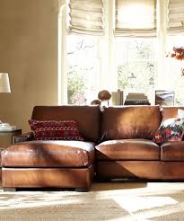 Made in china, the kennet is comprised of a sturdy metal and wood frame padded with thick layers of soft foam and upholstered in smooth faux leather. Living Room Rustic Leather Sofa Novocom Top