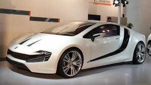 China to assemble an all electric sports car, in hopes of cutting down it pollution crisis. China Made Ferrari Ch Auto Shows Electric Sports Car Prototype In Beijing Http Flpbd It Pf3ef Electric Sports Car Sports Car Electric Car Concept