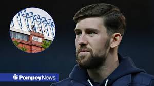 Portsmouth ace Callum Lang reacts as Rangers finalise new signing