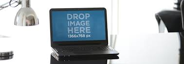 Placeit Laptop Mockup Featuring A Corporate Desk Glass Desk Desk Laptop Stand