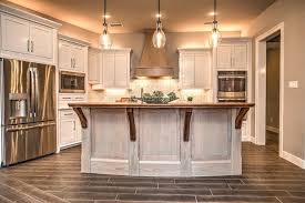 Pale butterscotch cabinetry provides a quiet glow in the morning light. Light Colored Cabinets Whitewash Cabinets Refinishing Cabinets Kitchen Design