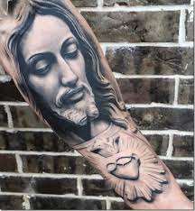 Modern tattoo ideas for jesus. Venerate Jesus Christ Tattoo Designs Nexttattoos