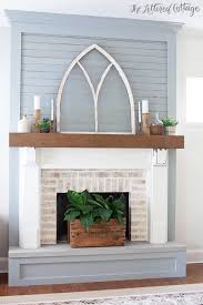 Constructed from real planks, this simple yet elegant piece fits perfectly in a modern or country chic setting. Fireplace Makeover Reveal The Lettered Cottage