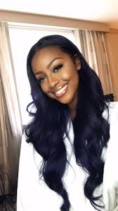 Weave hairstyles do not have to be a single color but can combine lowlights and highlights like this fantastic combination of blue hair color. Weave Hairstyles For Black Women On Stylevore