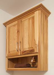 Rustic Varnished Birch Wood Wall Mounted Cabinet With Open Shelf And Carved Accent P Bathroom Cabinets Over Toilet Wood Storage Cabinets Bathroom Shelving Unit