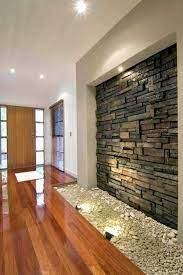 Sharp And Round Stones Emphasis On Texture Stone Wall Interior Design Stone Walls Interior Interior Wall Design