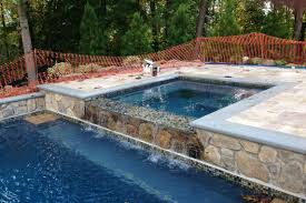 Pool Already Installed Wish You Had A Hot Tub Too It S Not Too Late Here S A Hot Tub Landscaping Pool Remodel Pool Landscape Design