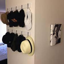 Find a closet door organizer at the store, order one, or build your own! 9 Diy Hat Rack Ideas For Any Home Enthusiasthome Diy Hat Rack Hat Rack Diy Hat