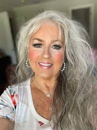 Marianne Charlton💜. That's Sandy Lichauer.