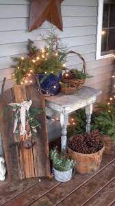 Pillows, ribbon, lanterns and mini trees add to the outdoor christmas decorations on this porch. 37 Porch Ideas For Christmas Christmas Decorations Christmas Outdoor Christmas