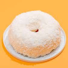 Pour sweetened condensed milk and topping into holes (this takes a while, you have to wait until it soaks in before you can pour all of the topping and milk in). White Chocolate Coconut Bundt Cake By Doan S Bakery Goldbelly