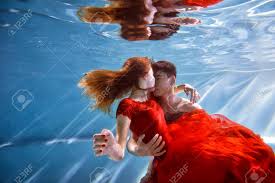Maybe you would like to learn more about one of these? Underwater In The Pool With The Purest Water Loving Couple Hugging The Feeling Of Love And Closeness Soft Stock Photo Picture And Royalty Free Image Image 72217775
