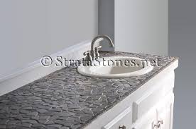 Make a gorgeous bathroom vanity top from mosaic glass tiles. The Knot Your Personal Wedding Planner Tile Bathroom Countertop Bathroom Countertops Tile Countertops