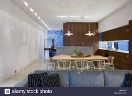 ceiling lights above wooden table in