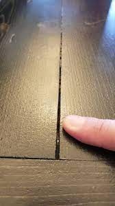 Wood putty is the best filling agent for use on outdoor furniture as it not only resists shrinkage but you can also buy or make tapered wood slivers to knock down into the gaps and then sand flat. Advice Filling Cracks Between Boards Table Woodworking