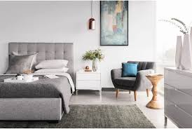 Upholstered and tufted or expertly finished to bring out the wood grain, our king storage bedroom sets have just the style for you. Moe S Home Collection Belle Storage Bed King Light Grey Fabric Rn 1001 29 Modern Furniture Canada
