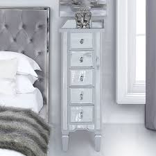 A tall dresser with a narrow footprint can create as much storage as possible in a tight space. Georgia Silver Mirrored 5 Drawer Slim Tallboy Cabinet Chest Of Drawers Picture Perfect Home