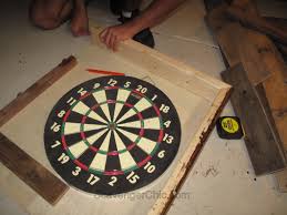 The shelf above the board. Dartboard Cabinet Diy Scavenger Chic