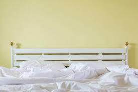 White Bedding Sheets And Pillow Messy