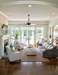 Open Concept Living Family Room With French Doors And Built Ins Flanking The Fireplace Wood Fl Open Concept Living Room Living Room Remodel Livingroom Layout