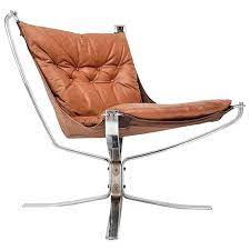 This is a standard chair with the backplate, back pole, and armrests connecting beautifully in a natural form. Chrome Based Cognac Leather Sigurd Ressell Designed 1970s Falcon Chair 1970s At 1stdibs