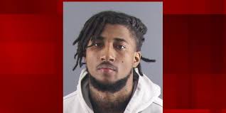 Man arrested, accused of robbing elderly woman at gunpoint in Peoria