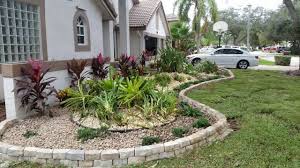 All this means is digging up parts of your garden and covering them in piles of rocks. On A Budget Front Yard Landscaping Design Ideas Youtube