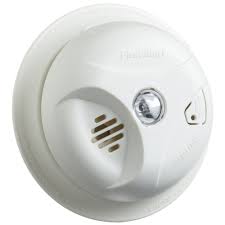 The battery compartment will be in the back of the unit and it requires a 9v battery. First Alert Battery Powered Ionization Smoke Detector 1039792 Home Security Smoke Gas Detectors