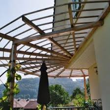 Pergola Als Terrassenuberdachung Halbrund Rankpflanze Wachst Uberdachung Terrasse Terrassenuberdachung Pergola Abdeckung
