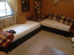 This instructable will hopefully show you how to make a twin size bed (for a 75x38 mattress) using common framing lumber and without lay the headboard flat on the floor to make sure it is not twisted and crosstape to make sure it is square. Corner Twin Bed Unit Trundle Google Search Corner Twin Beds Corner Unit Twin Beds Twin Bed With Storage