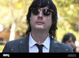 Producer and multi-instrumentalist of music duo Glass Candy, Johnny Padgett  leaves the Federal Court in Sydney, Monday, March 4, 2019. One of  Australia's biggest pop hits Love Is In The Air is