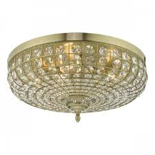 To speak with one of our experts call: 5 Light Flush Ceiling Light Antique Brass Crystal Lighting Company