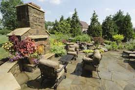 Stone pavers are what lay the foundation for this impeccable patio. Tuscan Landscape Design Landscaping Network