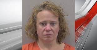Lexington woman arrested in weekend hatchet attack