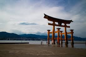 Itsukushima shrine is the main shrine of the island of miyajima which is located right across from hiroshima, japan. Itsukushima Shrine Hidden In The Shadows Of Hiroshima Bay