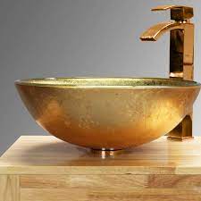 Available in a number of finishes and materials including hand finished vitreous china and natural metals you'll have no problems finding the perfect bathroom basin that's right for you. Dorato Gold Counter Top Glass Basin